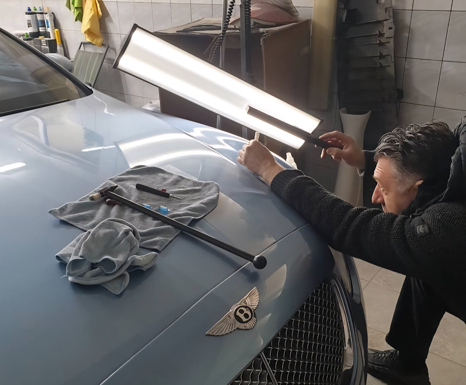 petrashPDR technician performing paintless dent repair